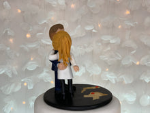 Load image into Gallery viewer, US Air Force and Doctor Wedding Cake Topper Figurine