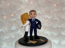 Load image into Gallery viewer, US Air Force and Doctor Wedding Cake Topper Figurine